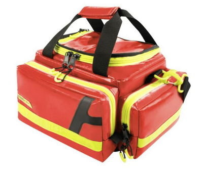 Eine kleine rote Notfalltasche mit gelben Warnstreifen von AEROcase (RBM1) die beim SKL als Notfalltasche-BLS genutzt wird.