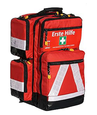 Ein mittlerer roter Notfallrucksack mit silbernen Warnstreifen von Team-Impuls der dem SKL als Übungs- und Ausbildungsrucksack dient.