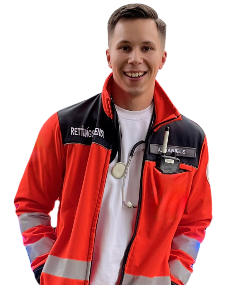 Junger Sanitäter in roter Uniform mit Stethoskop und freundlichem Lächeln. Alexandr Daniels von MEDucation.